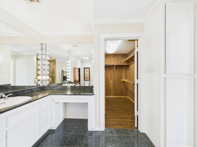 7608 Del Monte Dr, Houston, TX 77063 - full bath with double vanity, wooden walls, and baseboards