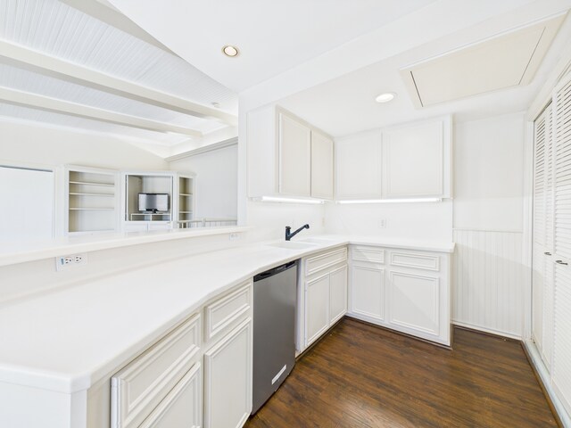 7608 Del Monte Dr, Houston, TX 77063 - kitchen with dishwasher, white cabinetry, light countertops, dark wood-style floors, and beam ceiling