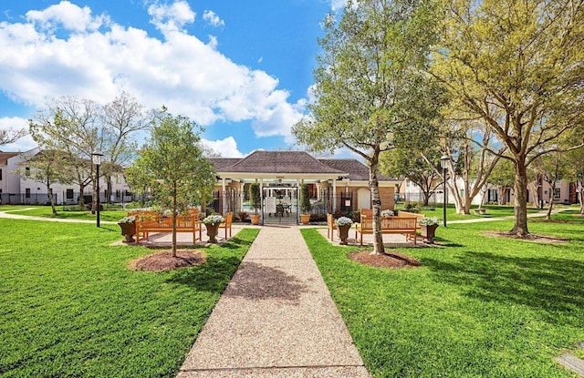 7608 Del Monte Dr, Houston, TX 77063 - back of property with a lawn and a gazebo