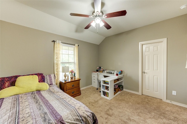 9710 Wild Orange Ct, Spring, TX 77379 - carpeted bedroom featuring lofted ceiling, baseboards, and ceiling fan