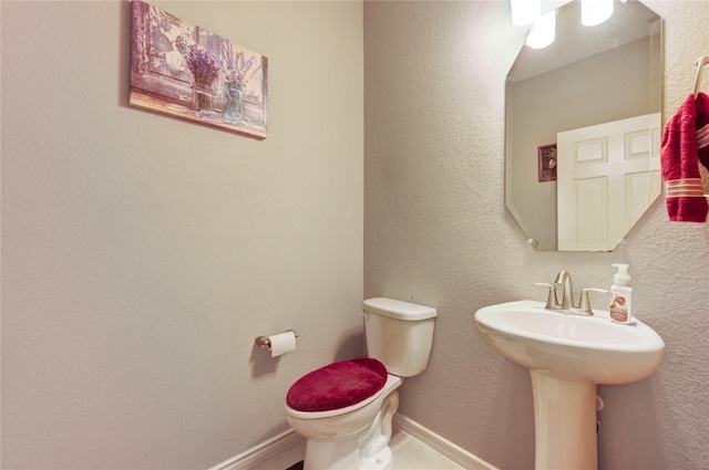 9710 Wild Orange Ct, Spring, TX 77379 - half bathroom featuring toilet and a sink