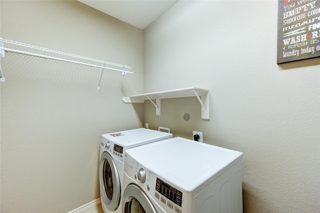 9710 Wild Orange Ct, Spring, TX 77379 - washroom with separate washer and dryer