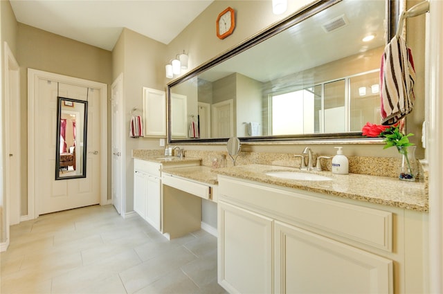 9710 Wild Orange Ct, Spring, TX 77379 - full bathroom featuring double vanity, tile patterned floors, a stall shower, and baseboards