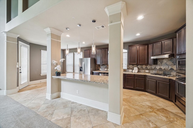 14603 Hampton Green Ln, Houston, TX 77044 - kitchen featuring stainless steel appliances, dark brown cabinetry, decorative columns, decorative backsplash, and recessed lighting