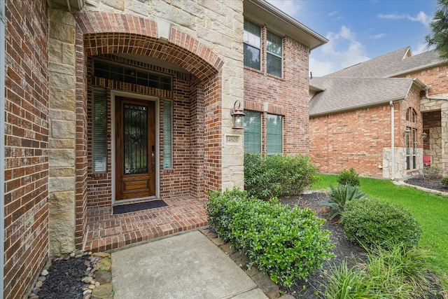 14603 Hampton Green Ln, Houston, TX 77044 - doorway to property with brick siding