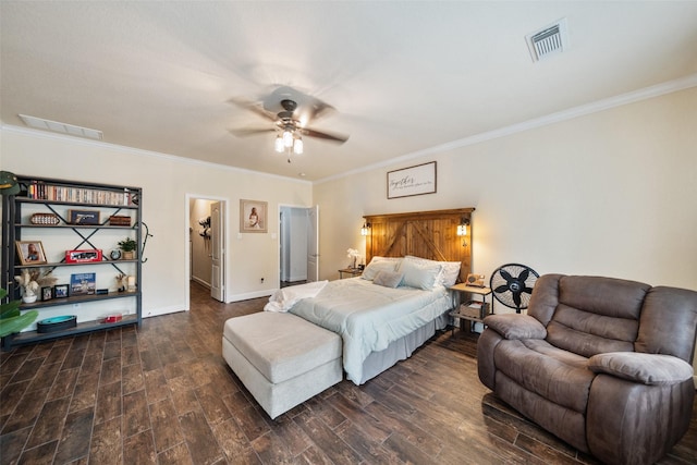 31318 Evergreen Park Ln, Conroe, TX 77385 - bedroom with ornamental molding, dark wood-style floors, baseboards, a ceiling fan, and a walk in closet