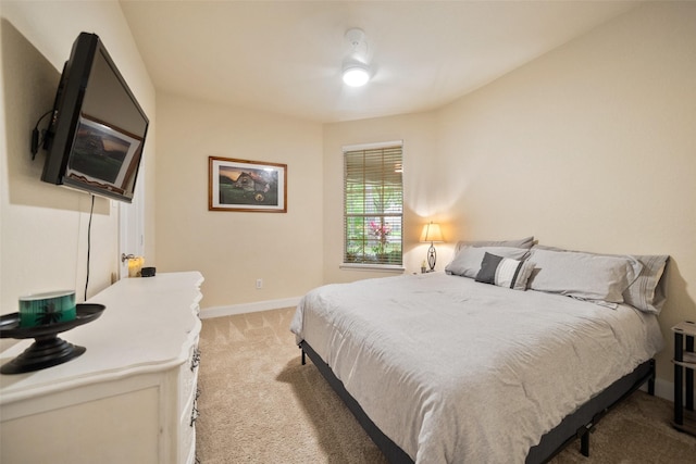 31318 Evergreen Park Ln, Conroe, TX 77385 - bedroom featuring light carpet and baseboards