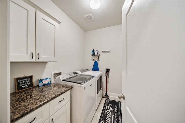 31318 Evergreen Park Ln, Conroe, TX 77385 - washroom with independent washer and dryer, cabinet space, and baseboards