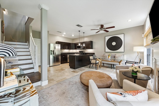 19 Crestwood Dr Unit 4, Houston, TX 77007 - living room with stairs, ceiling fan, recessed lighting, and light stone finish flooring