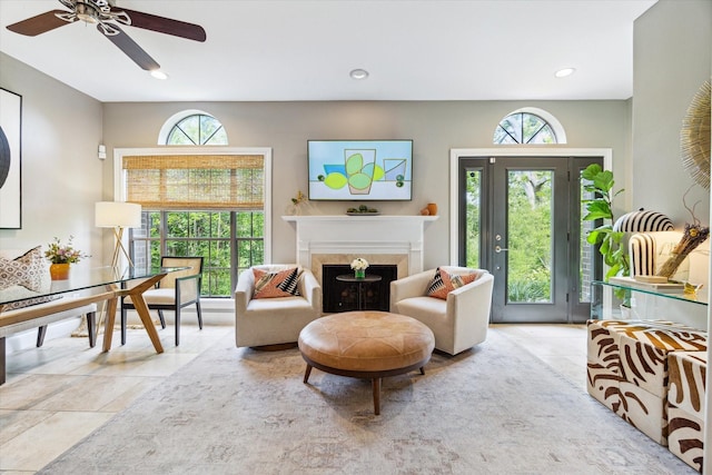 19 Crestwood Dr Unit 4, Houston, TX 77007 - living area featuring recessed lighting, ceiling fan, a fireplace, and tile patterned floors