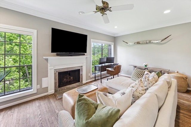 19 Crestwood Dr Unit 4, Houston, TX 77007 - living room with baseboards, ornamental molding, wood finished floors, a premium fireplace, and recessed lighting