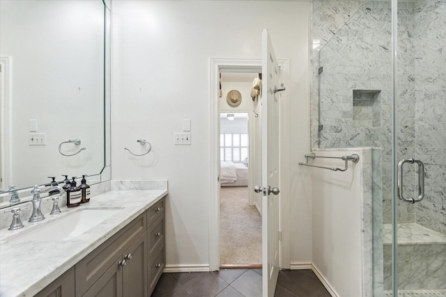19 Crestwood Dr Unit 4, Houston, TX 77007 - full bathroom with ensuite bath, vanity, tile patterned floors, a shower stall, and baseboards