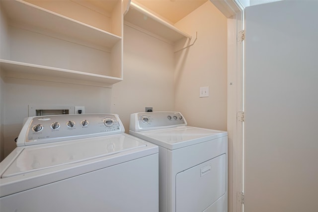 8143 Solara Bnd, Houston, TX 77083 - laundry area with washer and clothes dryer