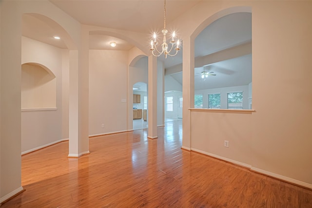 8143 Solara Bnd, Houston, TX 77083 - spare room featuring ceiling fan, baseboards, wood finished floors, a chandelier, and vaulted ceiling