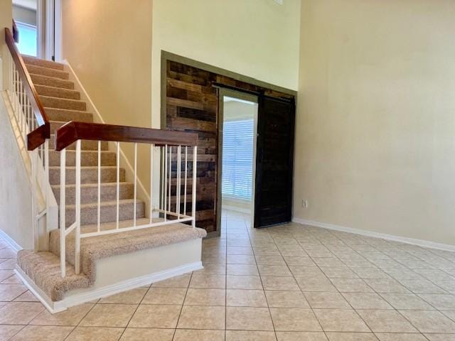15326 Lindita Dr, Houston, TX 77083 - stairway with tile patterned floors and baseboards