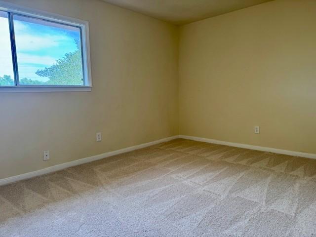 15326 Lindita Dr, Houston, TX 77083 - unfurnished room featuring carpet flooring and baseboards