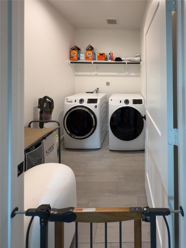 31334 Balsam Hawk Ln, Hockley, TX 77447 - washroom with washer and clothes dryer