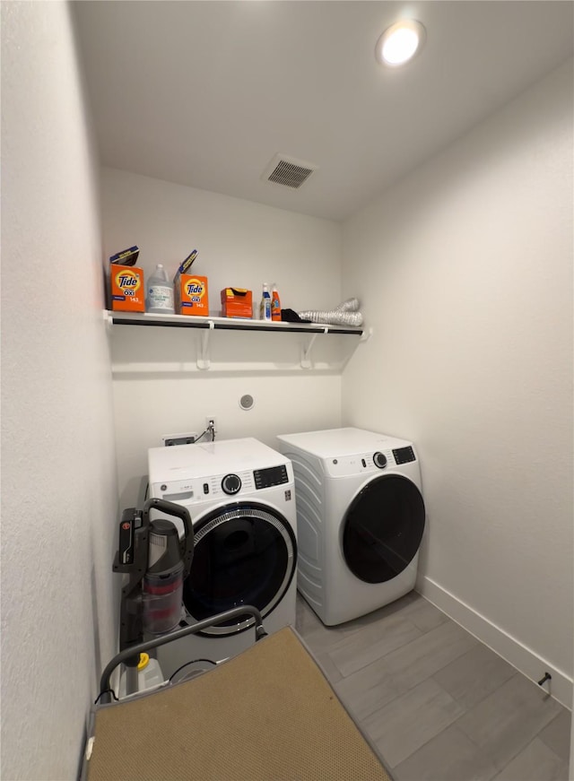 31334 Balsam Hawk Ln, Hockley, TX 77447 - laundry room featuring independent washer and dryer and baseboards