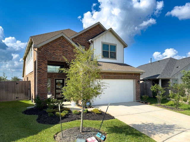 31334 Balsam Hawk Ln, Hockley, TX 77447 - view of front of property featuring brick siding, a garage, concrete driveway, and board and batten siding