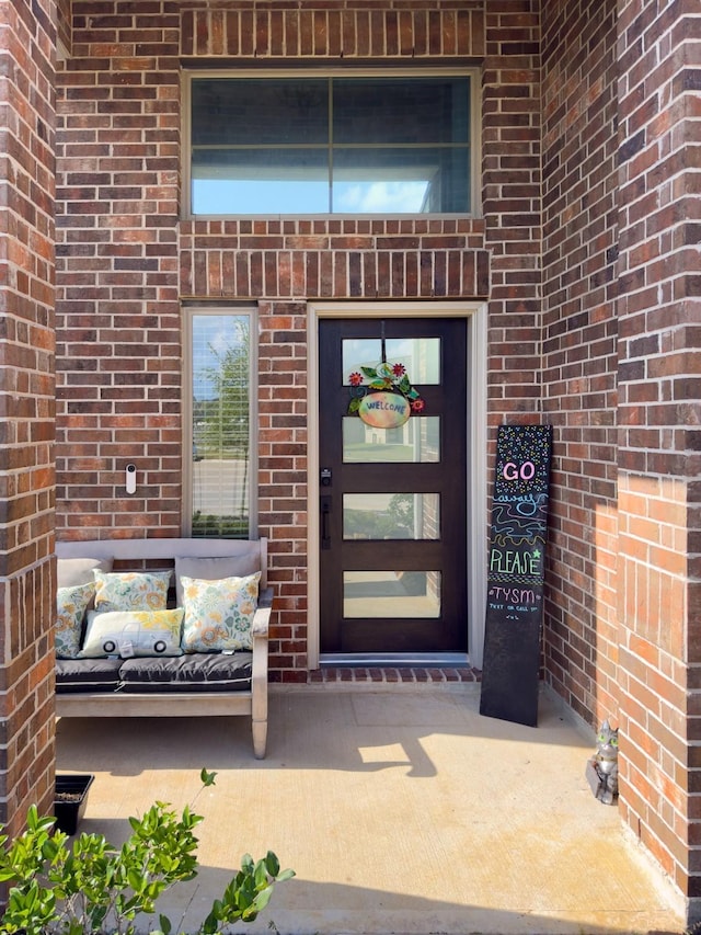 31334 Balsam Hawk Ln, Hockley, TX 77447 - view of exterior entry featuring brick siding