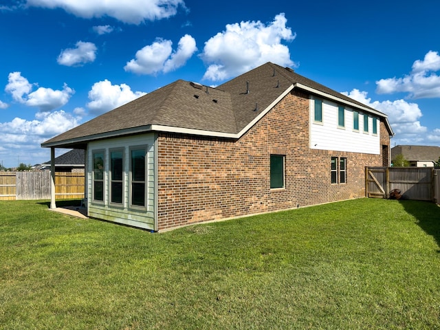 31334 Balsam Hawk Ln, Hockley, TX 77447 - back of property featuring brick siding and a shingled roof