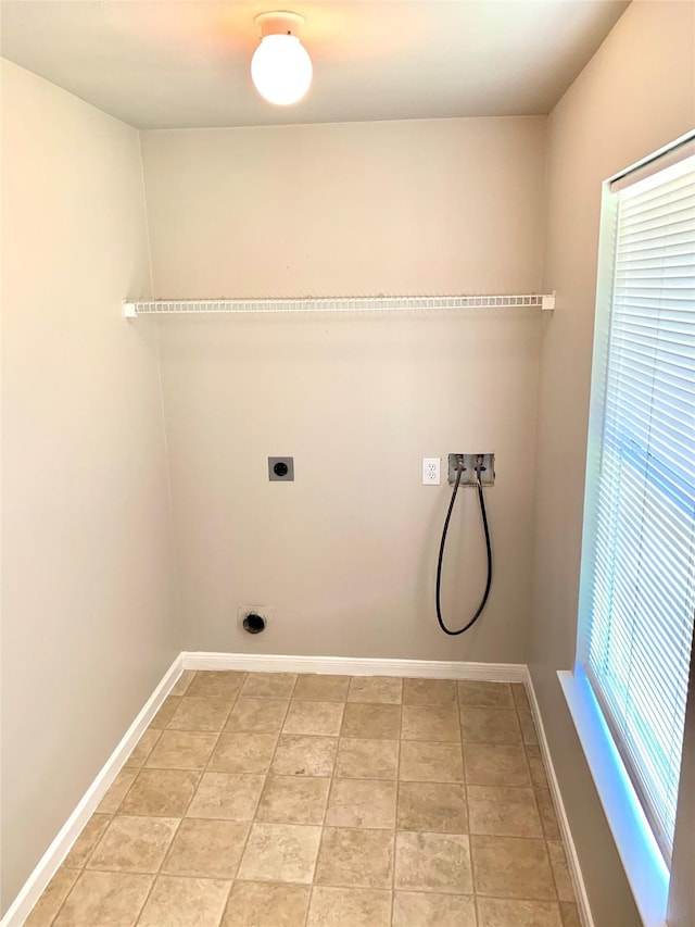 7302 River Pines Dr, Cypress, TX 77433 - washroom with hookup for an electric dryer, washer hookup, and baseboards