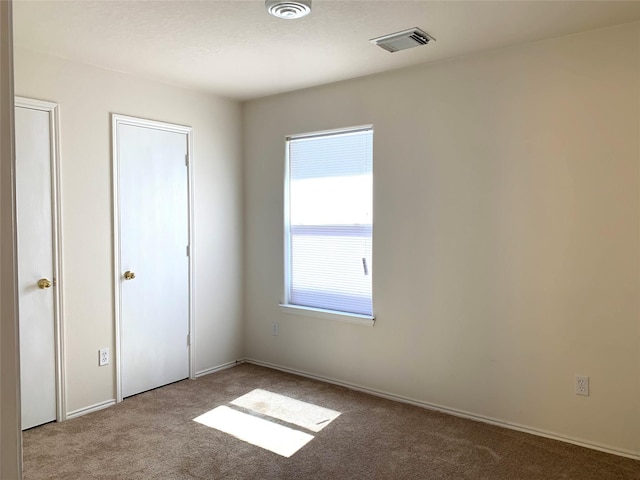 7302 River Pines Dr, Cypress, TX 77433 - unfurnished bedroom featuring carpet flooring