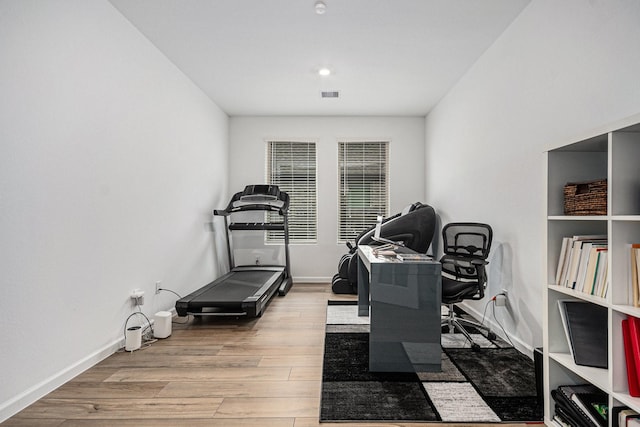 705 Western Fern, League City, TX 77573 - exercise room featuring wood finished floors and baseboards