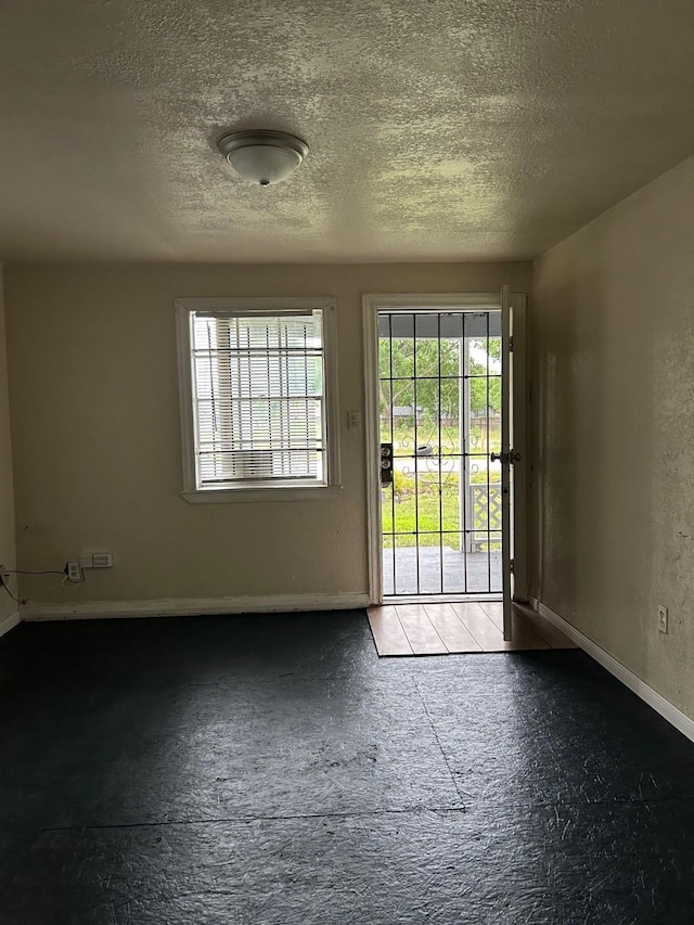 4412 Alvin St, Houston, TX 77051 - spare room featuring a textured ceiling and baseboards