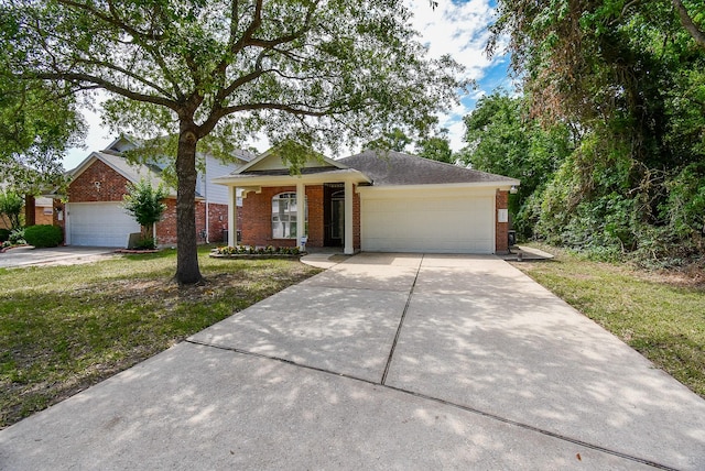 3219 Forest Willow Ln, Houston, TX 77068 - view of front of property featuring brick siding, concrete driveway, an attached garage, and a front yard