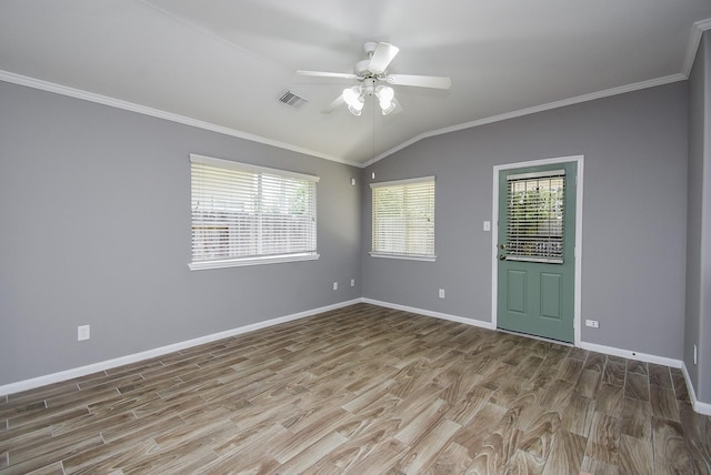 3219 Forest Willow Ln, Houston, TX 77068 - unfurnished room with vaulted ceiling, wood finished floors, a ceiling fan, baseboards, and ornamental molding