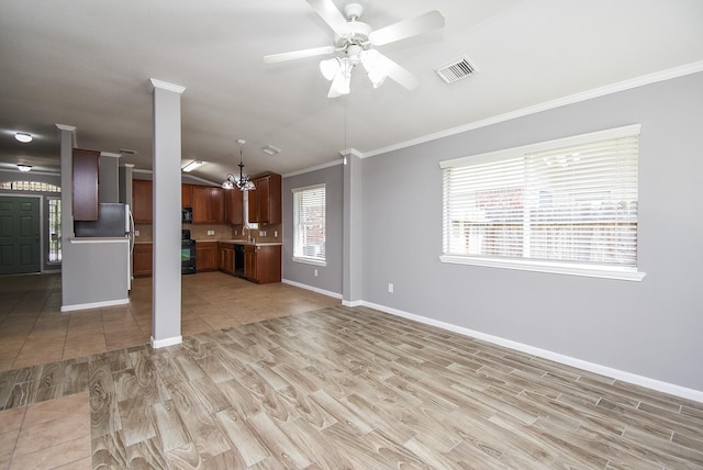 3219 Forest Willow Ln, Houston, TX 77068 - unfurnished living room featuring crown molding, light wood-type flooring, a ceiling fan, baseboards, and ornate columns