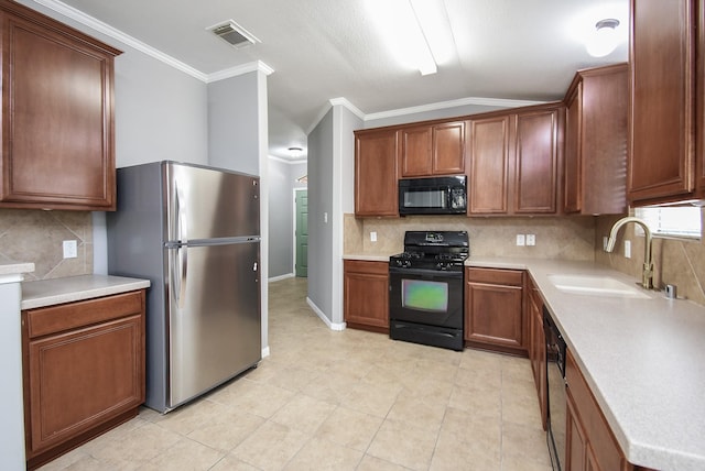 3219 Forest Willow Ln, Houston, TX 77068 - kitchen featuring black appliances, a sink, backsplash, light countertops, and ornamental molding