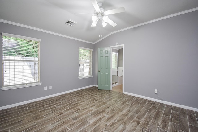 3219 Forest Willow Ln, Houston, TX 77068 - unfurnished room featuring wood finished floors, healthy amount of natural light, a ceiling fan, baseboards, and vaulted ceiling