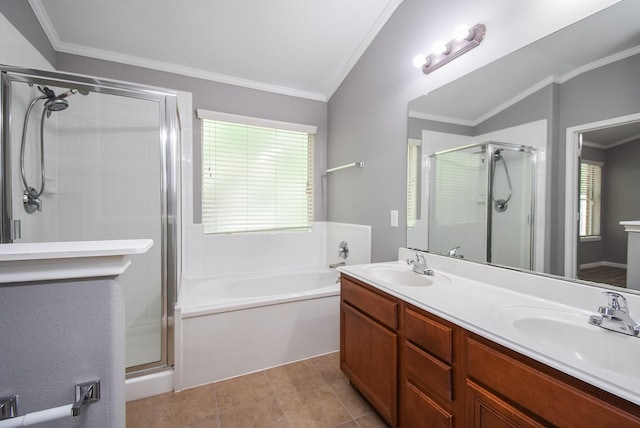 3219 Forest Willow Ln, Houston, TX 77068 - bathroom featuring a shower stall, a garden tub, double vanity, crown molding, and tile patterned floors