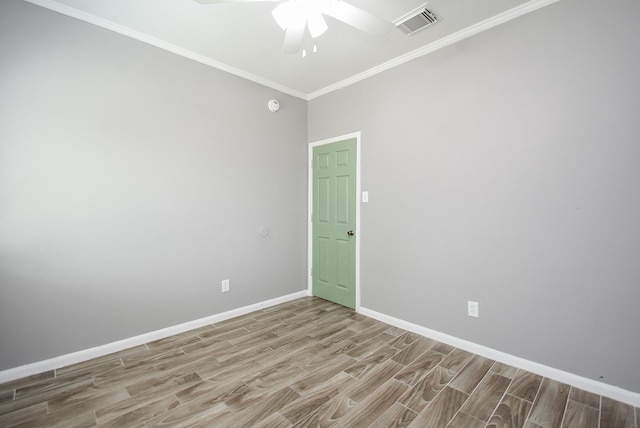 3219 Forest Willow Ln, Houston, TX 77068 - spare room with a ceiling fan, wood finished floors, crown molding, and baseboards