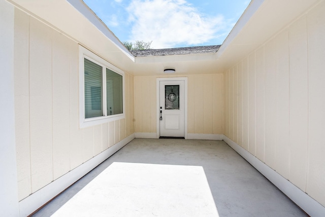 7418 Dew Mist Ln, Houston, TX 77095 - view of exterior entry with a patio