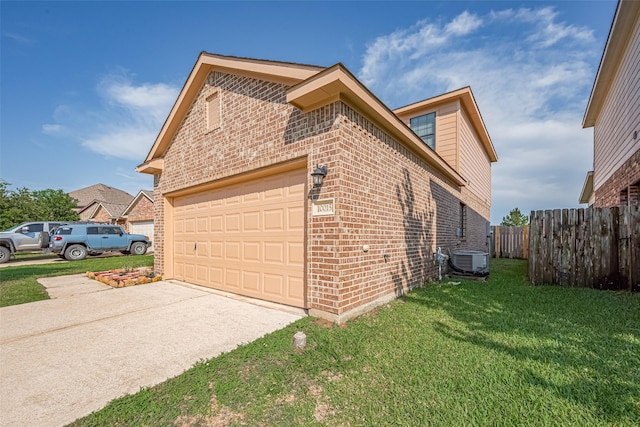 10015 Black Birch Ln, Tomball, TX 77375 - view of home's exterior with brick siding, a garage, concrete driveway, and central AC unit