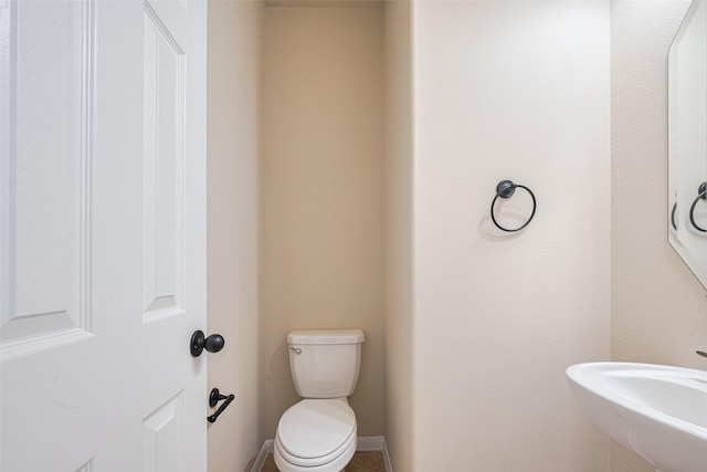10015 Black Birch Ln, Tomball, TX 77375 - bathroom featuring toilet and a sink