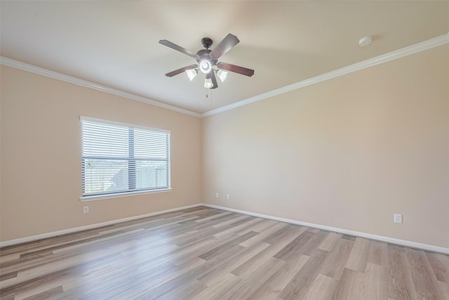 10015 Black Birch Ln, Tomball, TX 77375 - unfurnished room with ceiling fan, light wood-style floors, baseboards, and crown molding