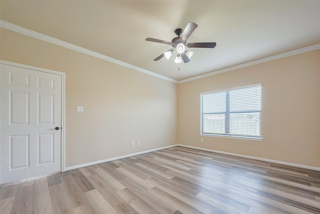 10015 Black Birch Ln, Tomball, TX 77375 - unfurnished room featuring light wood finished floors, a ceiling fan, baseboards, and ornamental molding