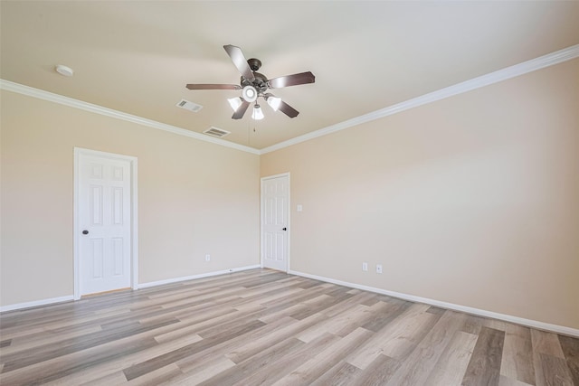 10015 Black Birch Ln, Tomball, TX 77375 - spare room with a ceiling fan, light wood-style floors, crown molding, baseboards, and a smoke detector