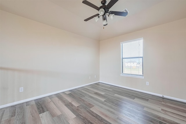 10015 Black Birch Ln, Tomball, TX 77375 - empty room featuring wood finished floors, baseboards, and ceiling fan