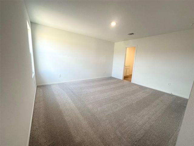 16477 Blossom Grove Dr, Conroe, TX 77303 - empty room with carpet floors and baseboards