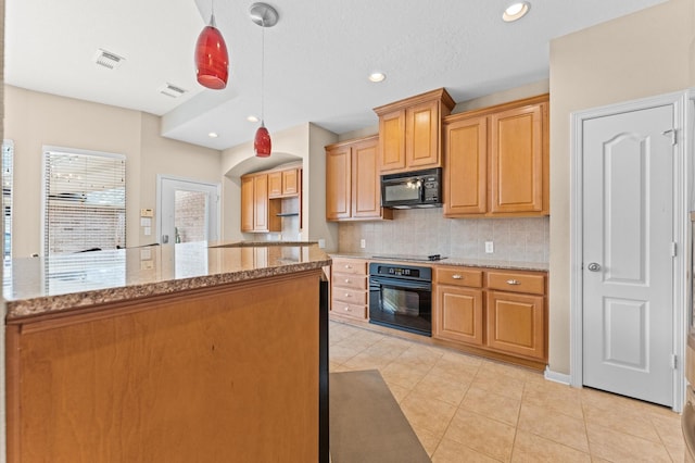 2411 Clippers Sq, Houston, TX 77058 - kitchen featuring black appliances, decorative backsplash, light tile patterned flooring, light stone counters, and hanging light fixtures