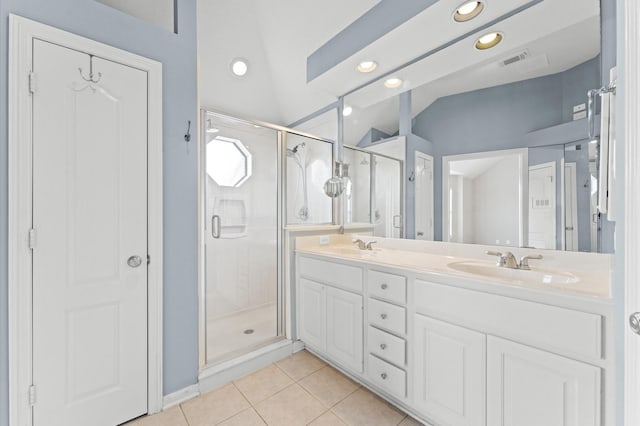 2411 Clippers Sq, Houston, TX 77058 - bathroom featuring double vanity, a stall shower, recessed lighting, tile patterned floors, and lofted ceiling
