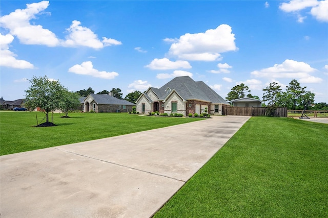 5219 Camp Creek Rd, Baytown, TX 77523 - french country inspired facade with concrete driveway