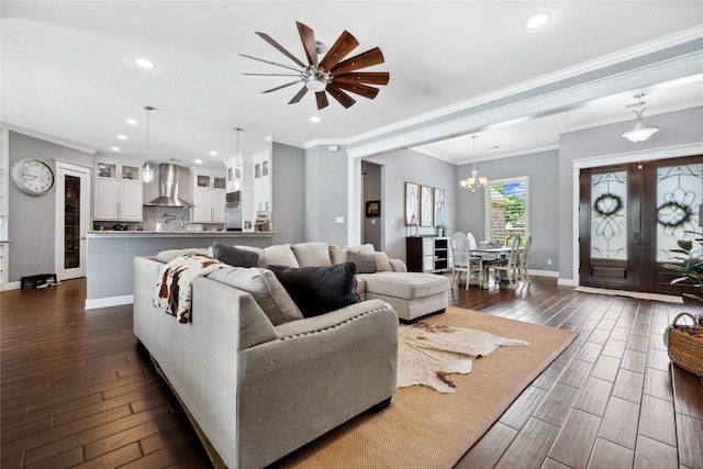 5219 Camp Creek Rd, Baytown, TX 77523 - living area featuring dark wood finished floors, french doors, ornamental molding, ceiling fan, and baseboards