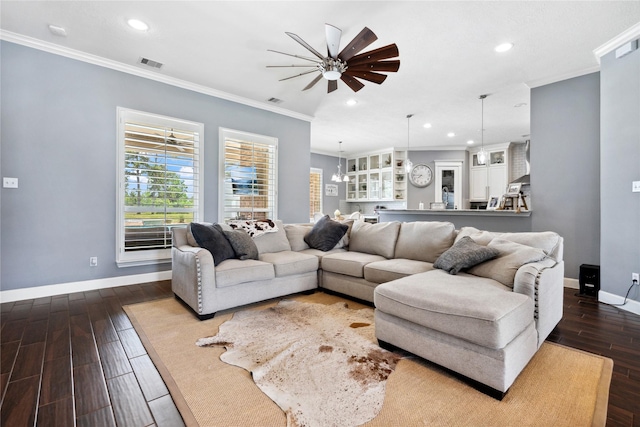 5219 Camp Creek Rd, Baytown, TX 77523 - living area featuring ceiling fan, baseboards, ornamental molding, dark wood-type flooring, and recessed lighting