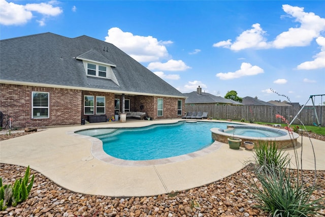5219 Camp Creek Rd, Baytown, TX 77523 - view of swimming pool with a fenced backyard, an outdoor living space, a patio, and a pool with connected hot tub